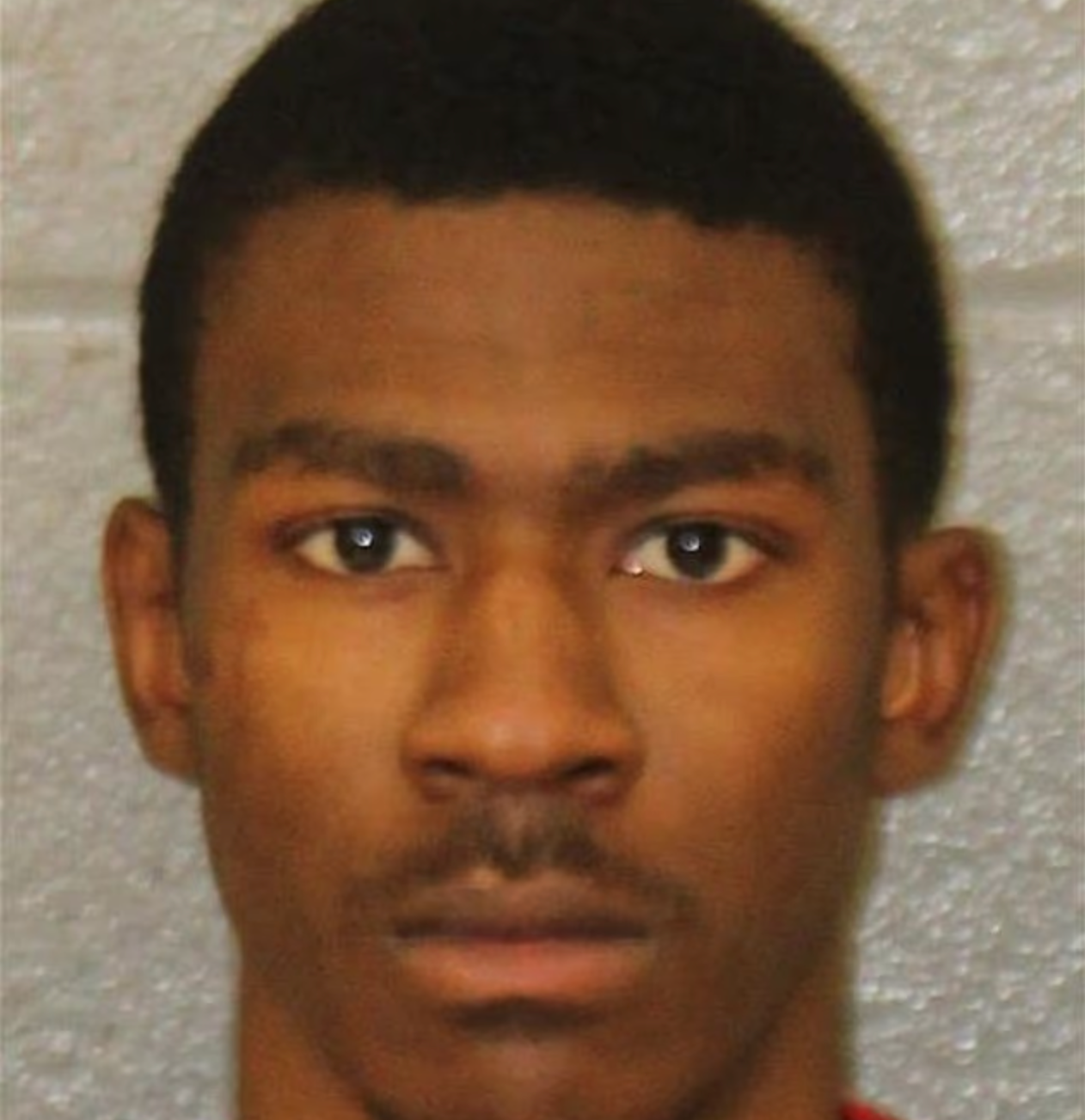 Terrance Jackson, 22, was charged with accessory after the fact for allegedly helping to dispose of one of the stolen vehicles used in the shooting