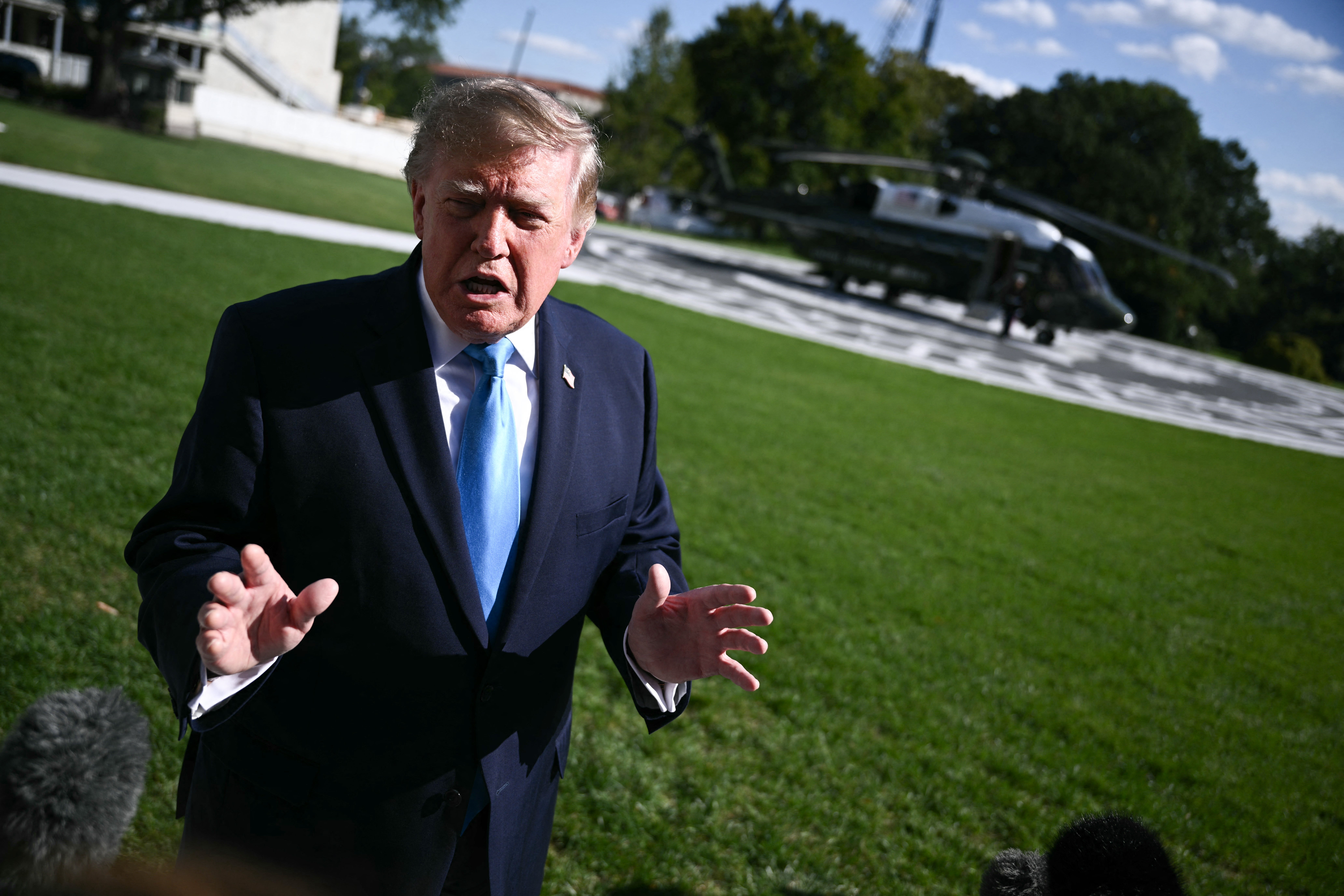 Trump tells supporters to vote by mail, reversing fraud claims