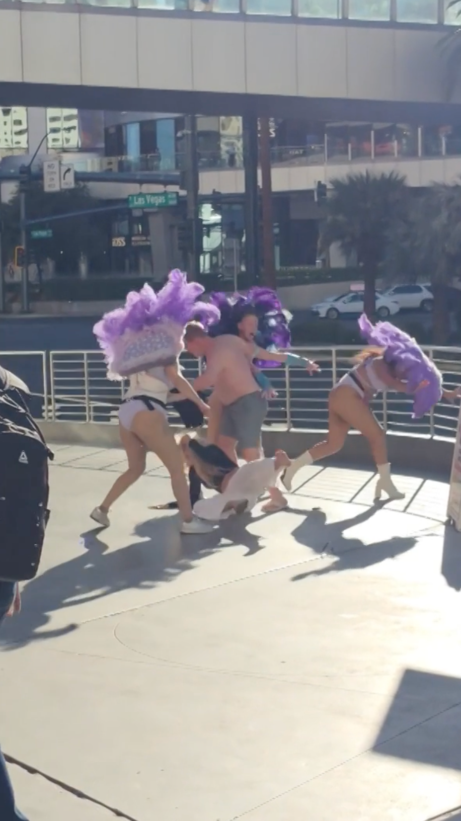 A male tourist lost his shirt during the brawl