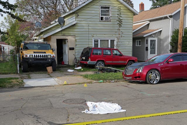 Two women were found shot dead in the street, while the remaining victims and the suspected gunman were found dead inside the home