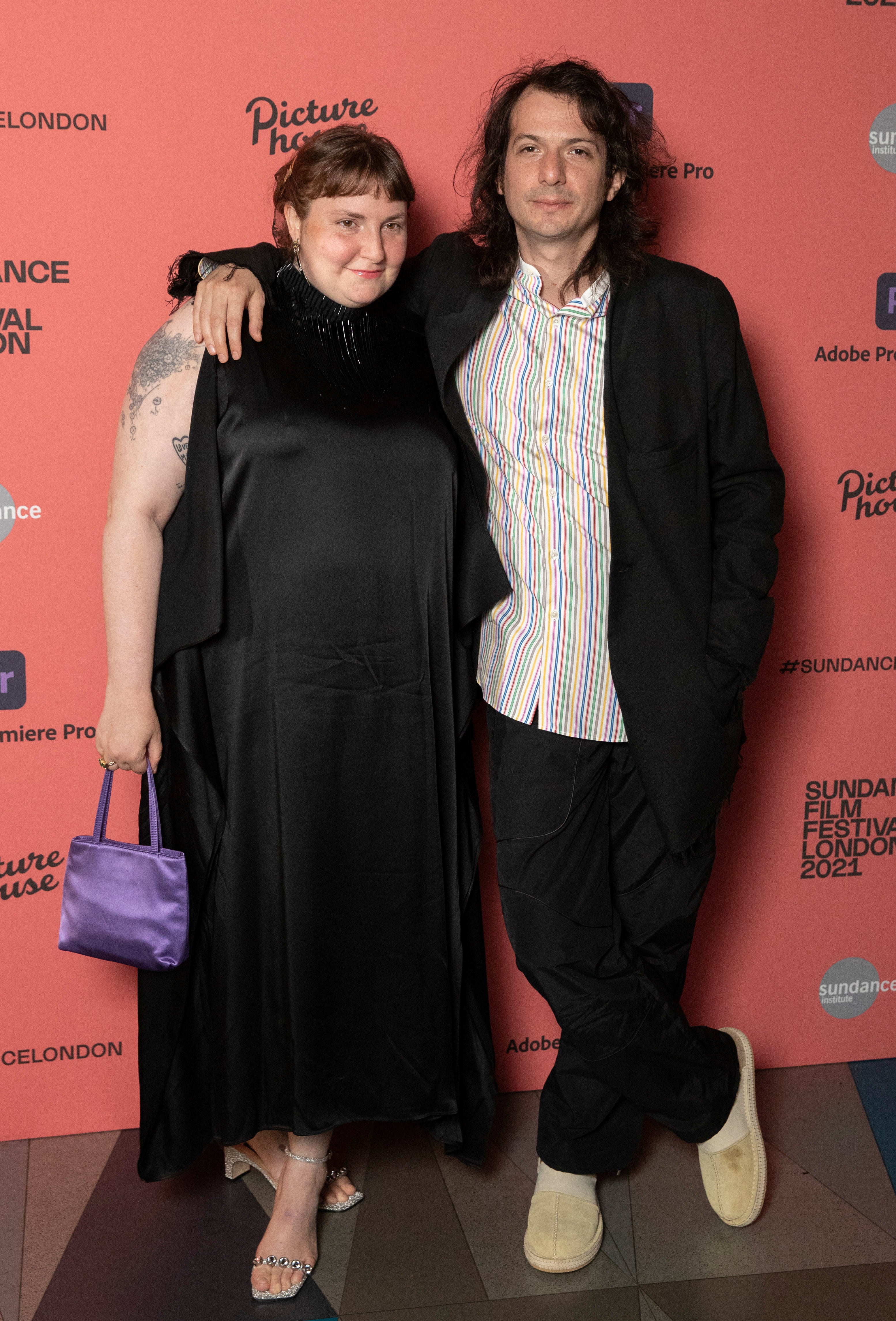 Lena Dunham, pictured with Luis Felber, has a ‘trading club’ with her mum friends