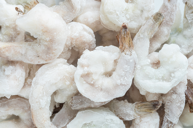 An 18-year-old Bronx man and a juvenile were arrested for allegedly unloading frozen shrimp, salmon and other seafood from a refrigerated tractor-trailer into a 26-foot box truck in North Arlington, New Jersey
