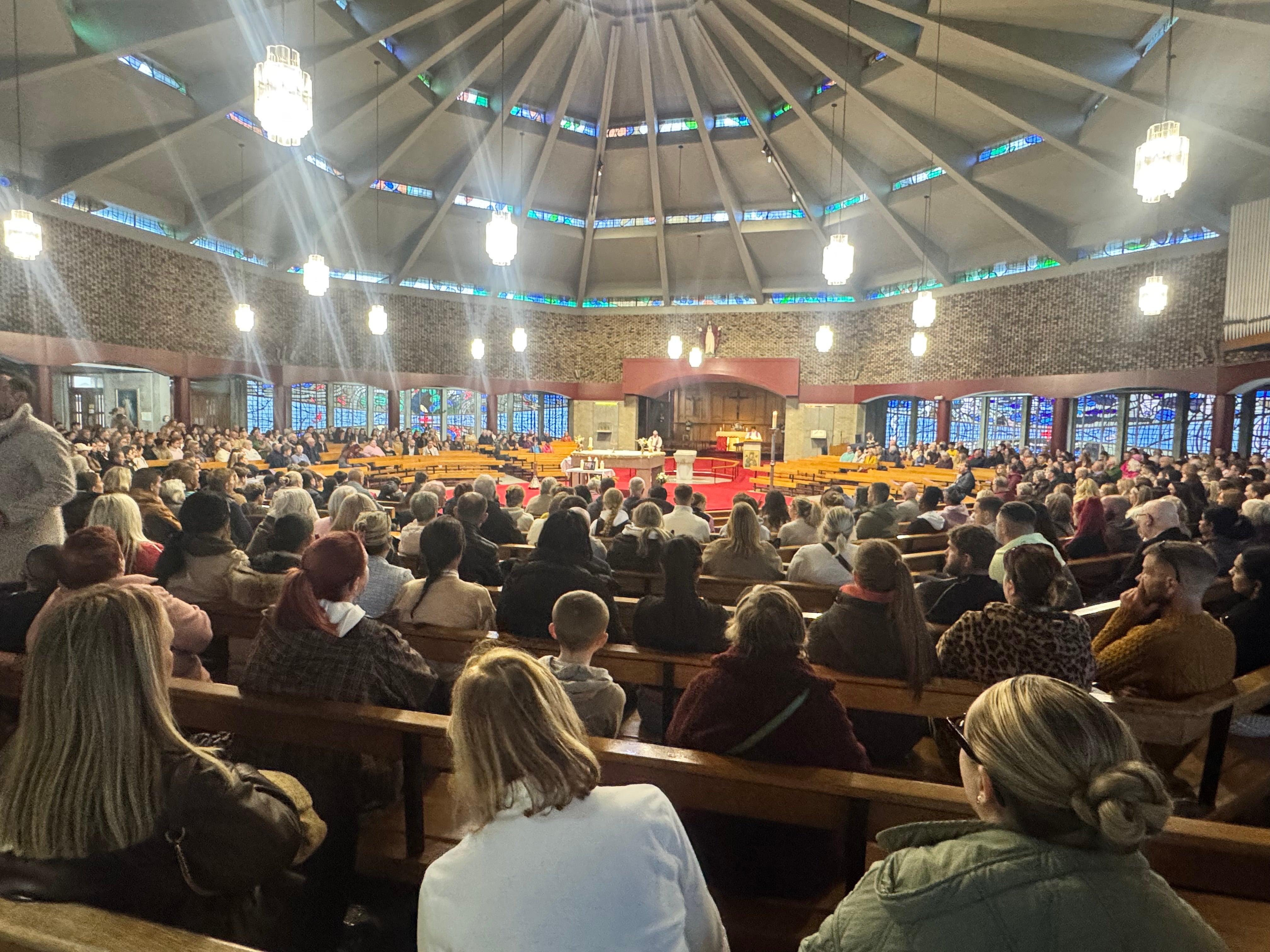 People attended the vigil at Sacred Heart Church in Waterford.