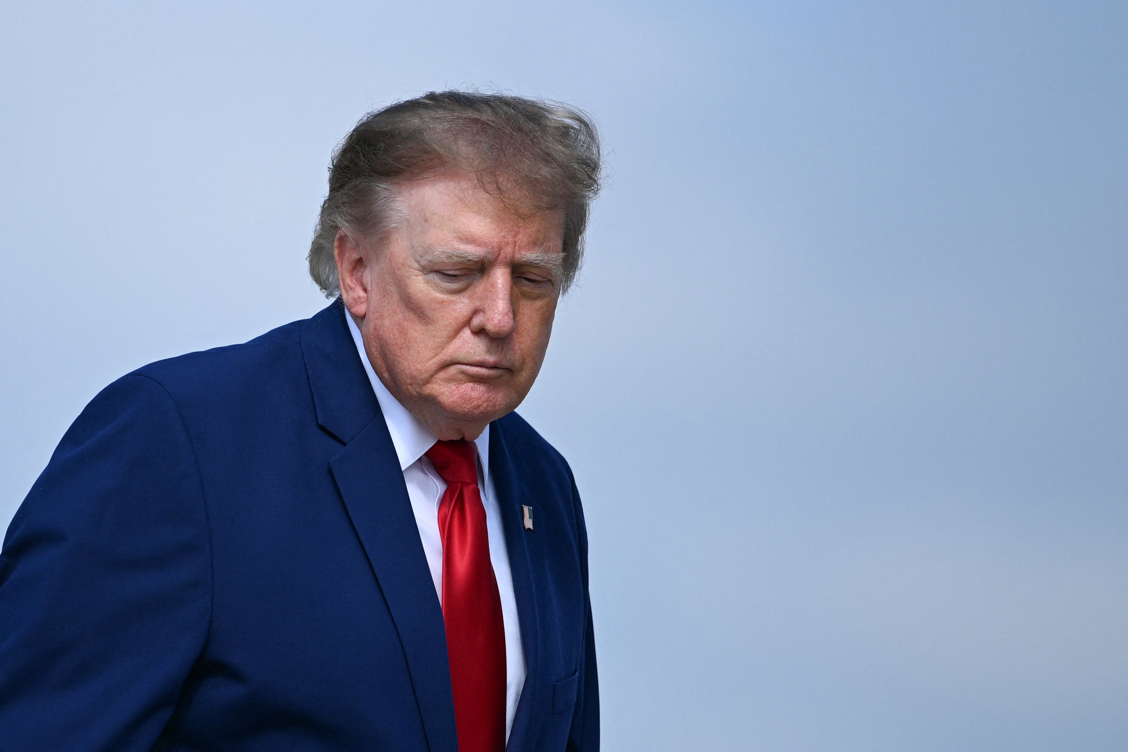 Save America PAC, President Donald Trump's legal fund, is nearly $2 million in debt, according to a new filing (AFP via Getty Images)
