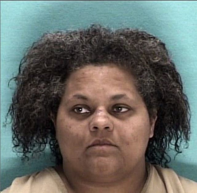 Jacqueline Coleman, 32, faces charges of third-degree felony child endangerment after authorities discovered nine children living in severe conditions. Coleman is currently being held on $150,000 bond at the Licking County Justice Center