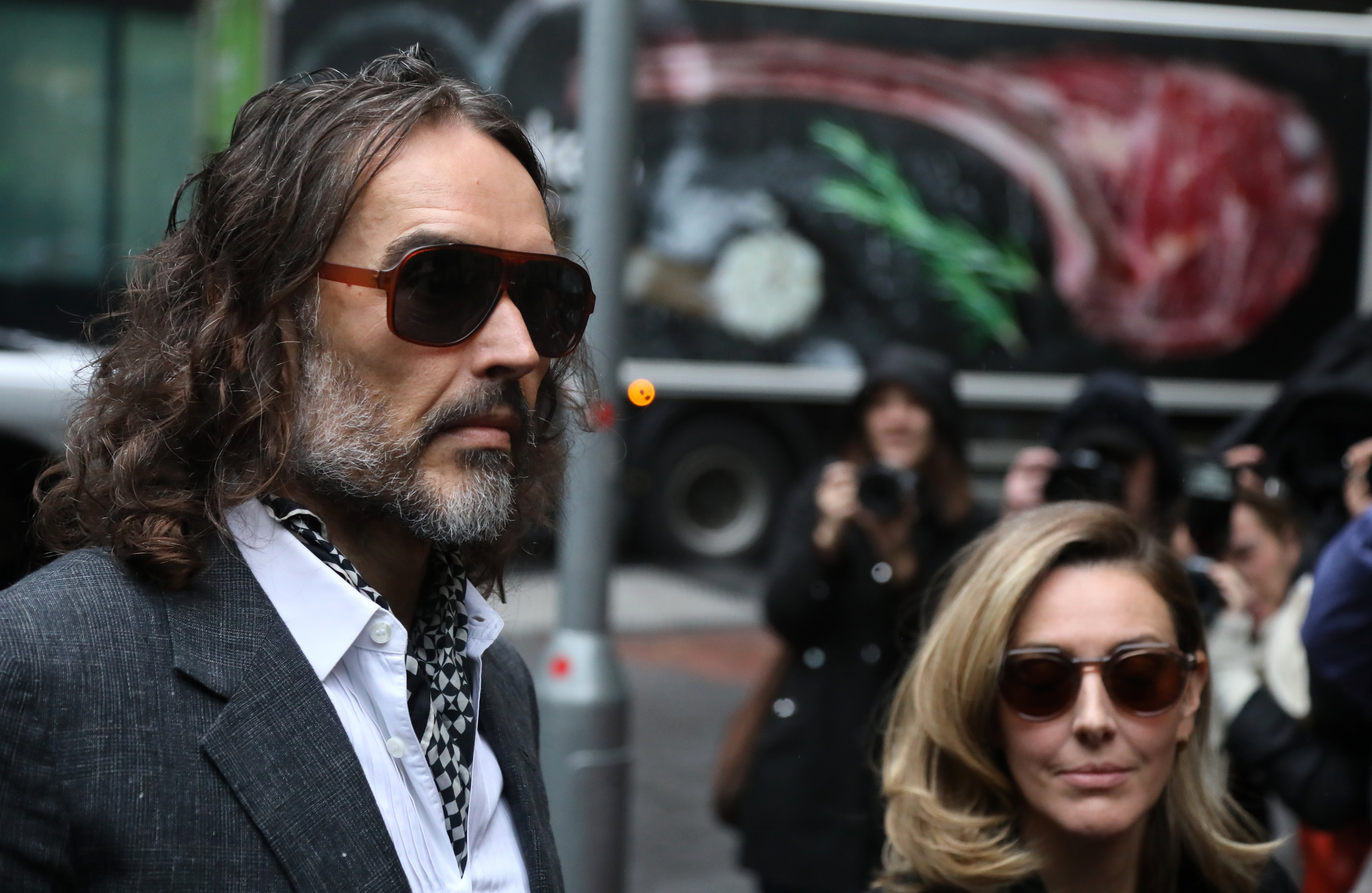 Russell Brand trial live: Comedian asked assistant for phone numbers of female fans, court told