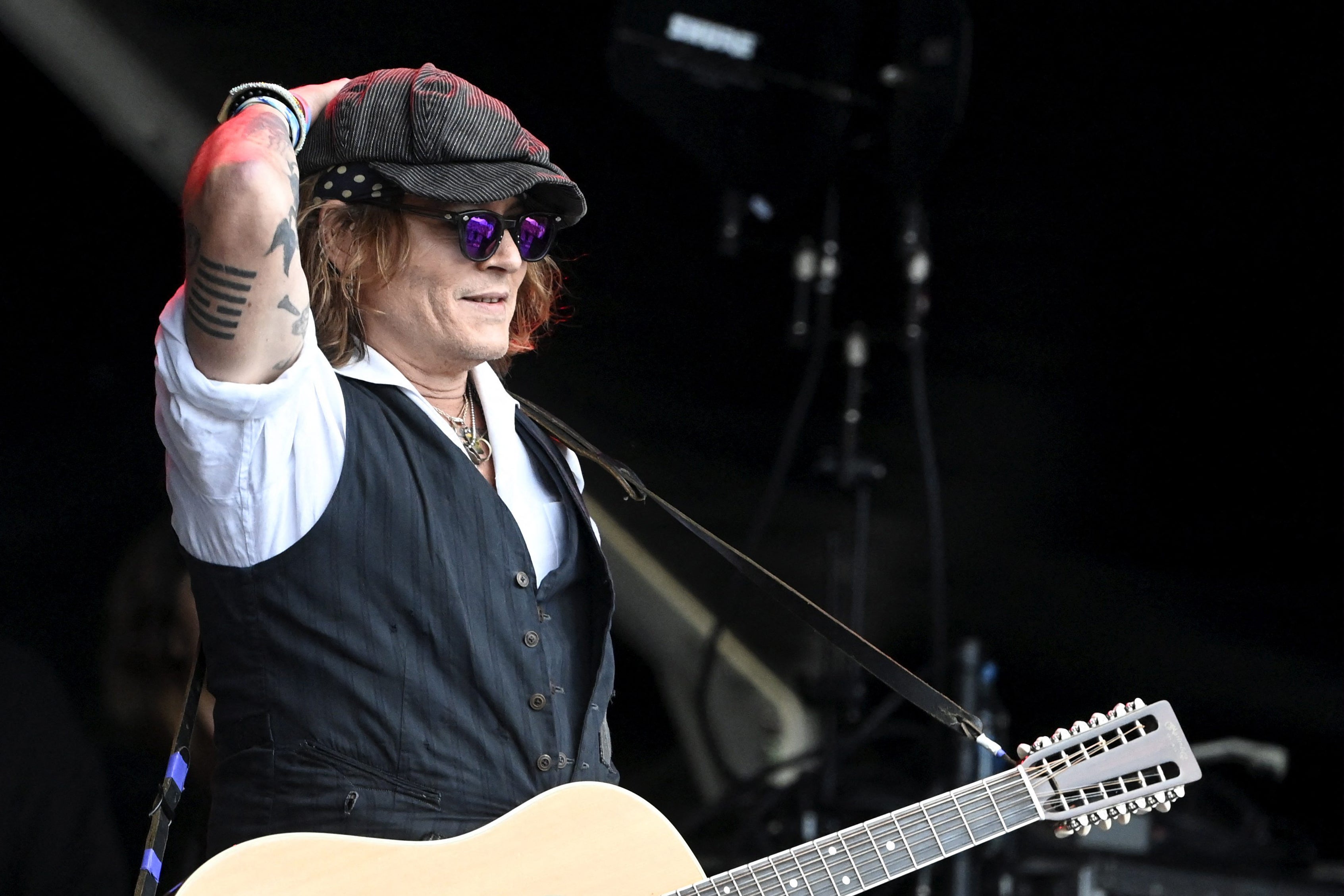 Johnny Depp joins Aerosmith for surprise appearance at star-studded show - The Independent