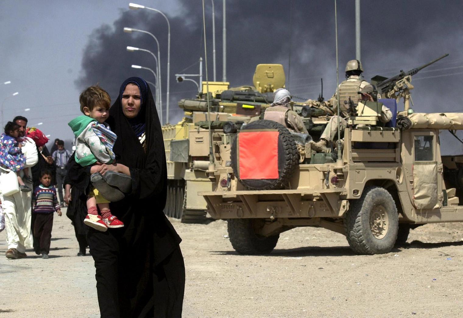 Residents fleeing the Iraqi city of Basra in March 2003