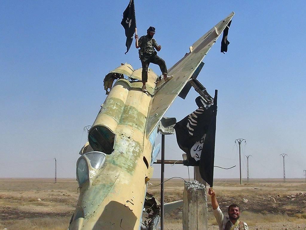 Isis troops near Raqqa, Syria