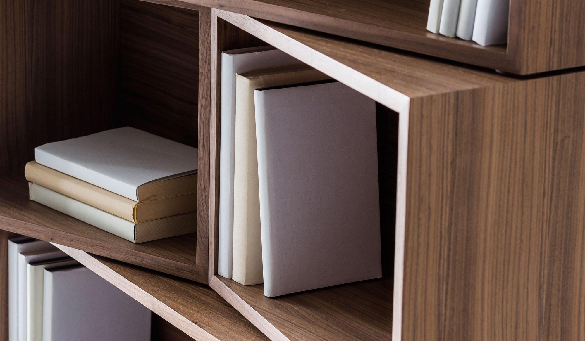 Stack the units in this bookshelf the conventional way, or put them on a slant