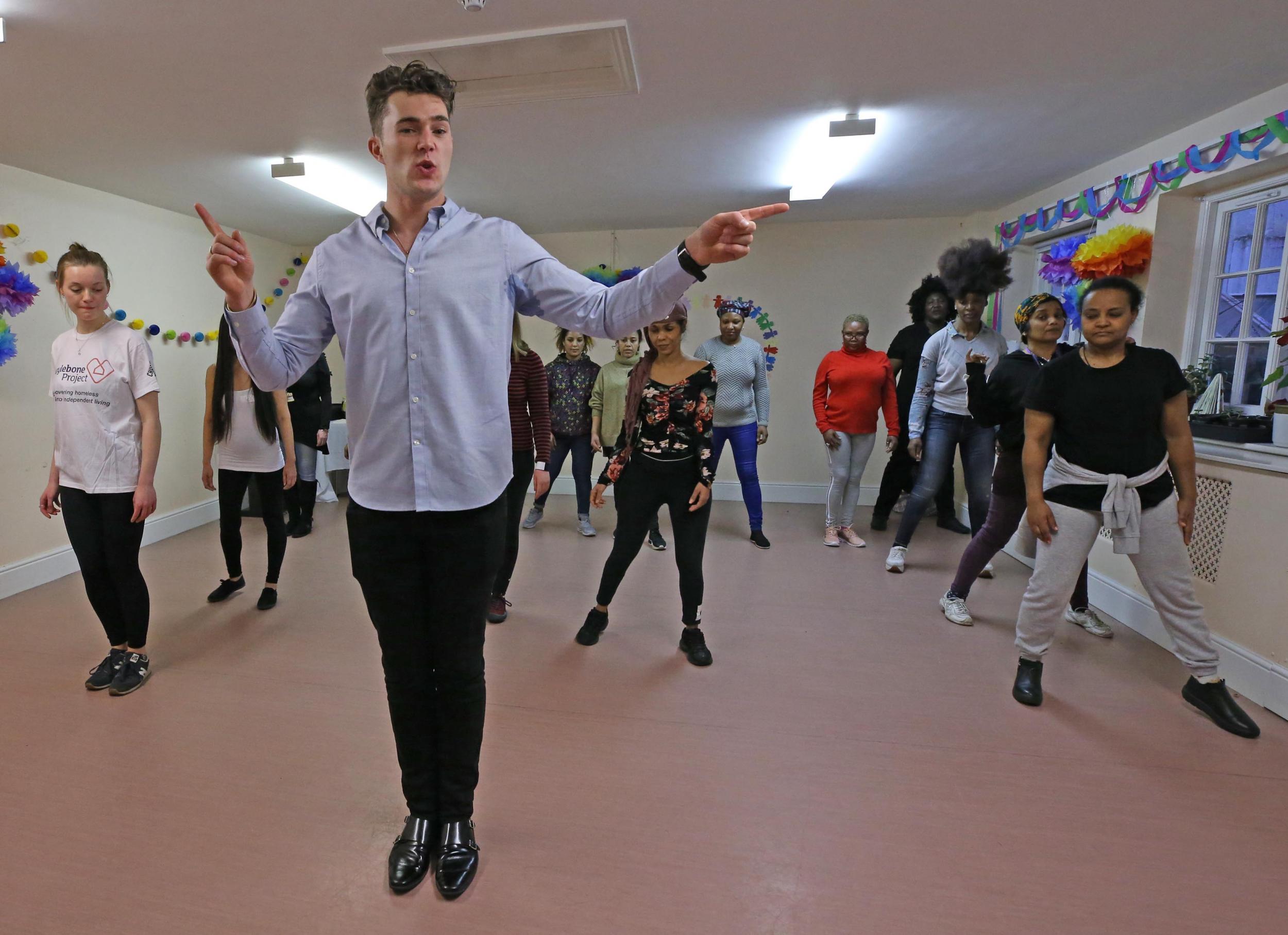 Curtis leads a cha-cha class, teaching the women to spot-turn, ‘new york’ and swivel their hips (Nigel Howard)