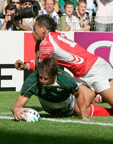 Boks' captain, Bob Skinstad, scores against Tonga