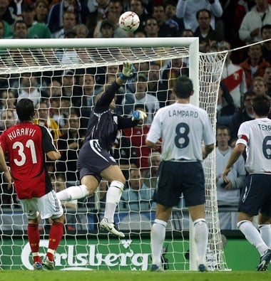 Germany's Kevin Kuranyi scores past Paul Robinson at Wembley