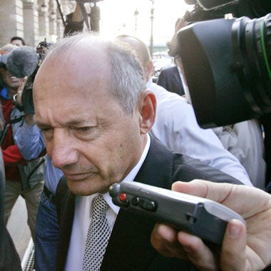 McLaren boss Ron Dennis arrives at the Paris hearing