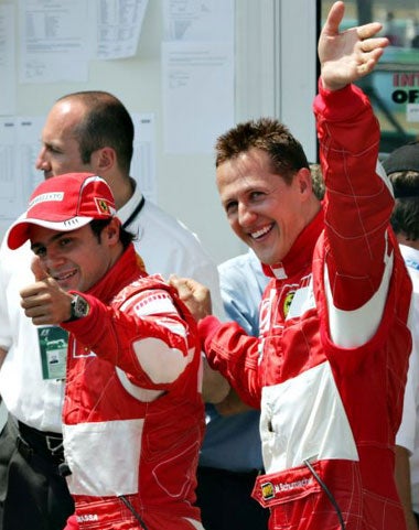 Ferrari drivers Massa (left) and Schumacher will start the French GP from the front of the grid