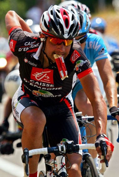 Pereiro takes on some food during his 13th stage breakaway
