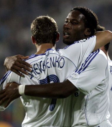 Drogba and Andrei Shevchenko celebrate one of the Ivorians three goals against Levski Sofia