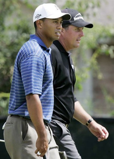 Woods and Mickelson on the seventh hole at Medinah