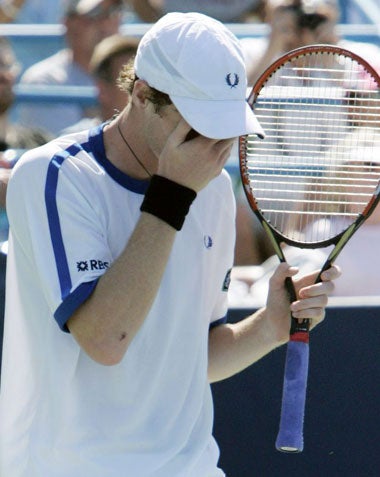 Murray is overwhelmed after victory over Roger Federer