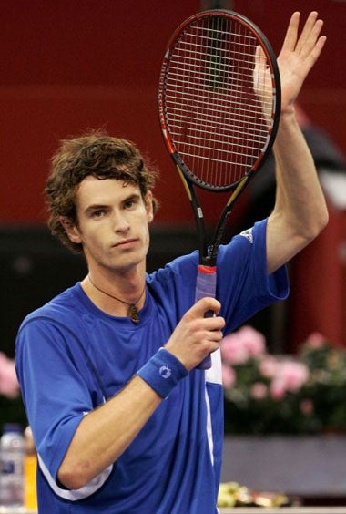 Murray salutes the Madrid crowd after his 6-4, 3-6, 6-3 Masters victory over Ivan Ljubicic