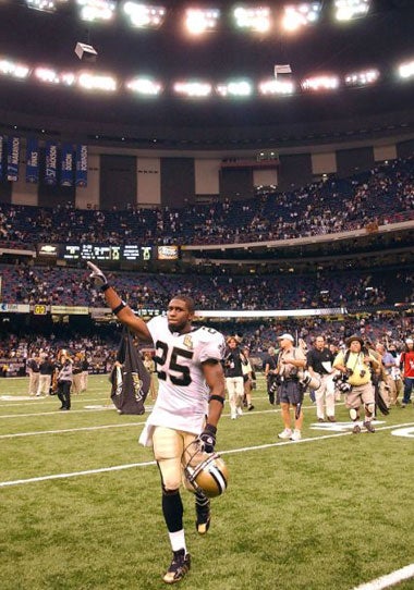 Reggie Bush celebrates the Saints 23-3 win over Atlanta on their return to the Superdome