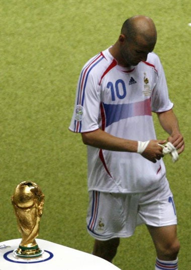 Zidane leaves the field in Berlin after his head-butt on Materazzi