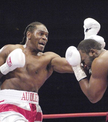 Harrison (left) launches an uppercut during last nights fight