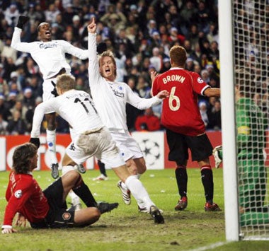 Copenhagen players celebrate their winning goal against United