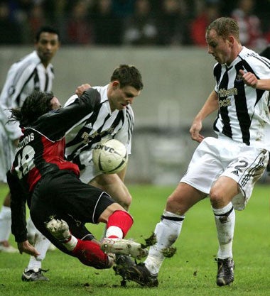 The Magpies get stuck-in to the German defence