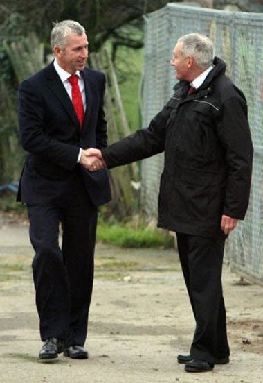 Pardew (left) meets the staff ahead of his first press conference as Charlton manager