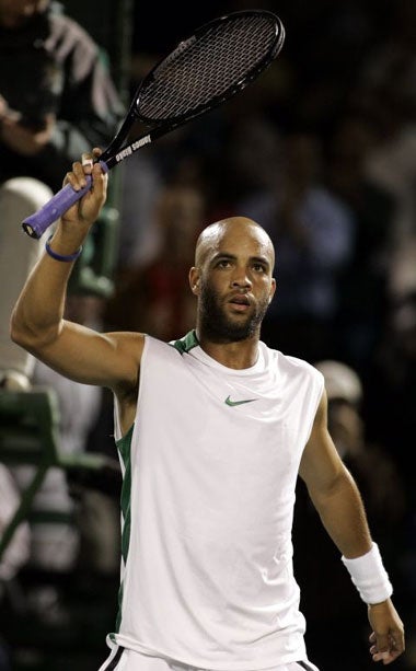 Blake celebrates his 4-6, 6-1, 6-0 win over Juan Ignacio Chela