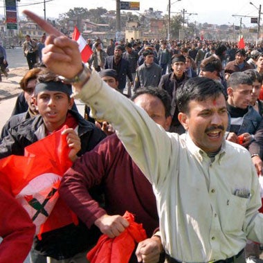 Pro-democracy activists protest in Katmandu against the dictatorial King Gyanendra