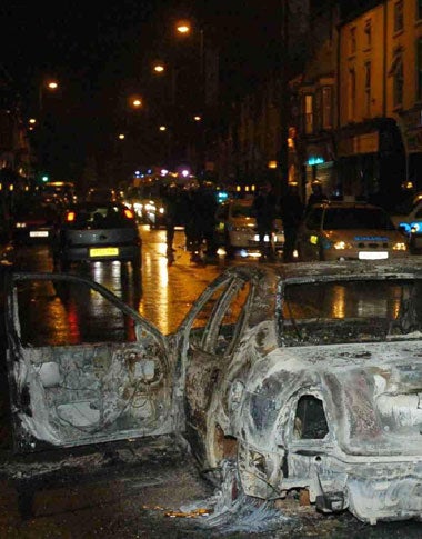 "They were a large group, more than 100 hooded youths with baseball bats running through the streets. They hit my car with the bats and kicked it, they also attacked other motorists."