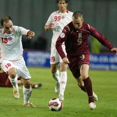 Kenny Miller tries to break down the Georgian defence