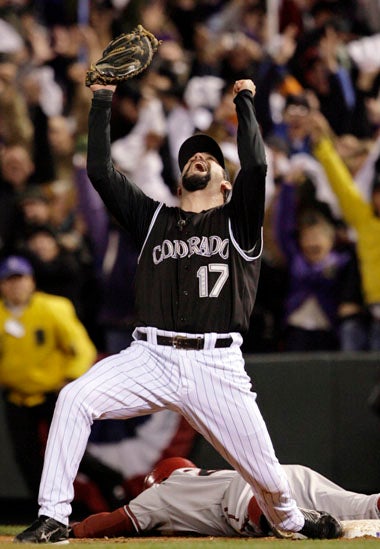 Todd Helton celebrates making the last out in the 6-4 win over the Arizona Diamondbacks