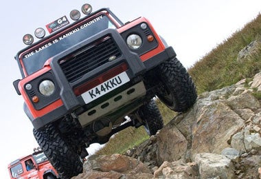 Kankku drivingschool's 4x4 offroadersin action onthe Lake District'srugged terrain