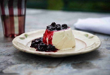 Blackcurrants are an ideal accompaniment to cool, creamy panna cotta. © Lisa Barber