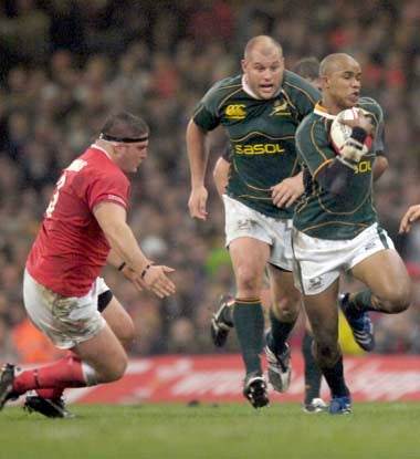 Springboks winger J P Pietersen on his way to scoring a try at the Millennium Stadium yesterday