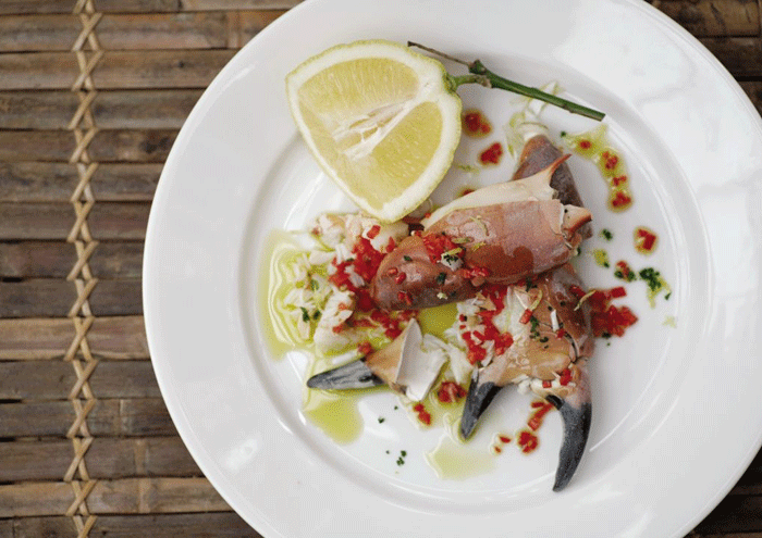 Cracking starter: Skye keeps crab claws simple with chilli oil and wedges of lemon © Keiko Oikawa