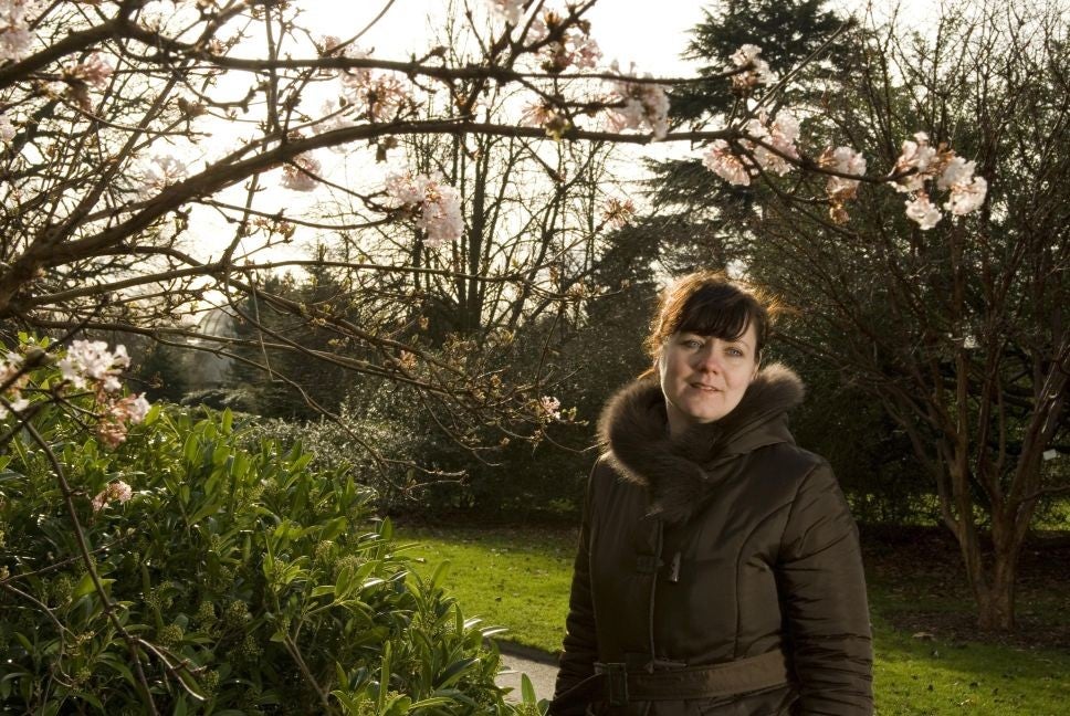 Heaven scent: Emma takes in the perfume of the viburnum shrubs at Kew © Elsa Quarsell