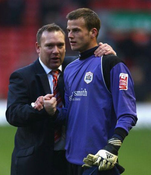 Barnsley have not won their four Championship games since their cup victory over Liverpool, but Davey (left) sees no reason why his side cannot beat Chelsea