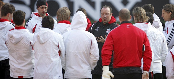 Rafael Benitez instructs his Liverpool players during yesterday's training session at Anfield