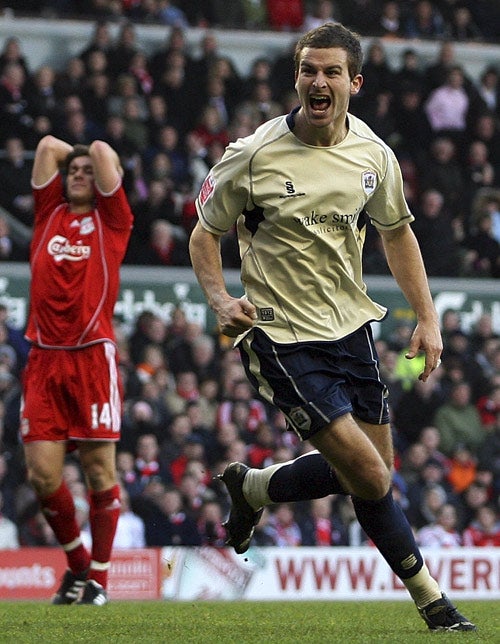 Barnsley's Stephen Foster celebrates scoring against Liverpool