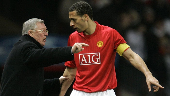 Alex Ferguson and Rio Ferdinand discuss tactics during United's hard fought battle with Lyons