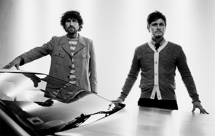 Boys and the hood: Gruff Rhys (left) and Boom Bip with the inspirational DeLorean DMC-12 [KALUS THYMANN]