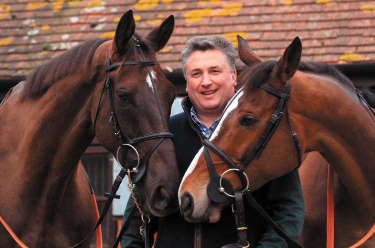 Trainer Paul Nicholls with Kauto Star (right) and Denman at his stables at Ditcheat, near Wincanton