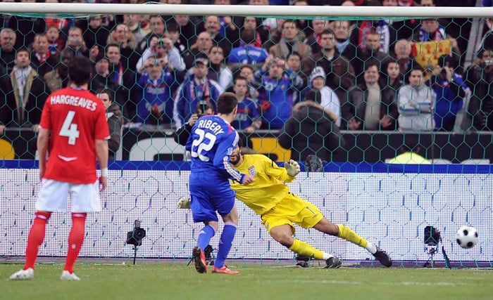 Franck Ribéry sends England's David James the wrong way to put France ahead from the penalty spot in the 32nd minute at Stade de France last night