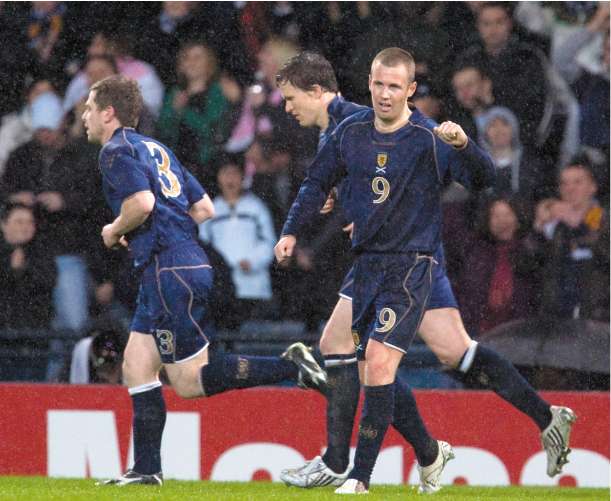 Kenny Miller celebrates scoring Scotland's equaliser in their encouraging 1-1 drawwith Croatia at Hampden Park