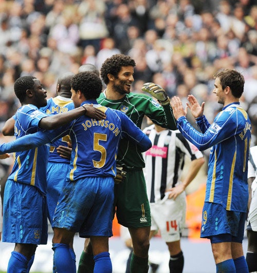 Portsmouth's players celebrate their passage into the FA Cup final