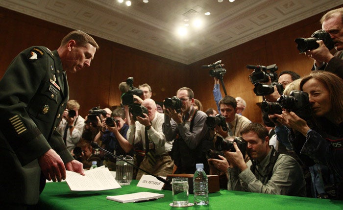 General Petraeus arrives to testify before the Senate Armed Services Committee on the status of the war in Iraq